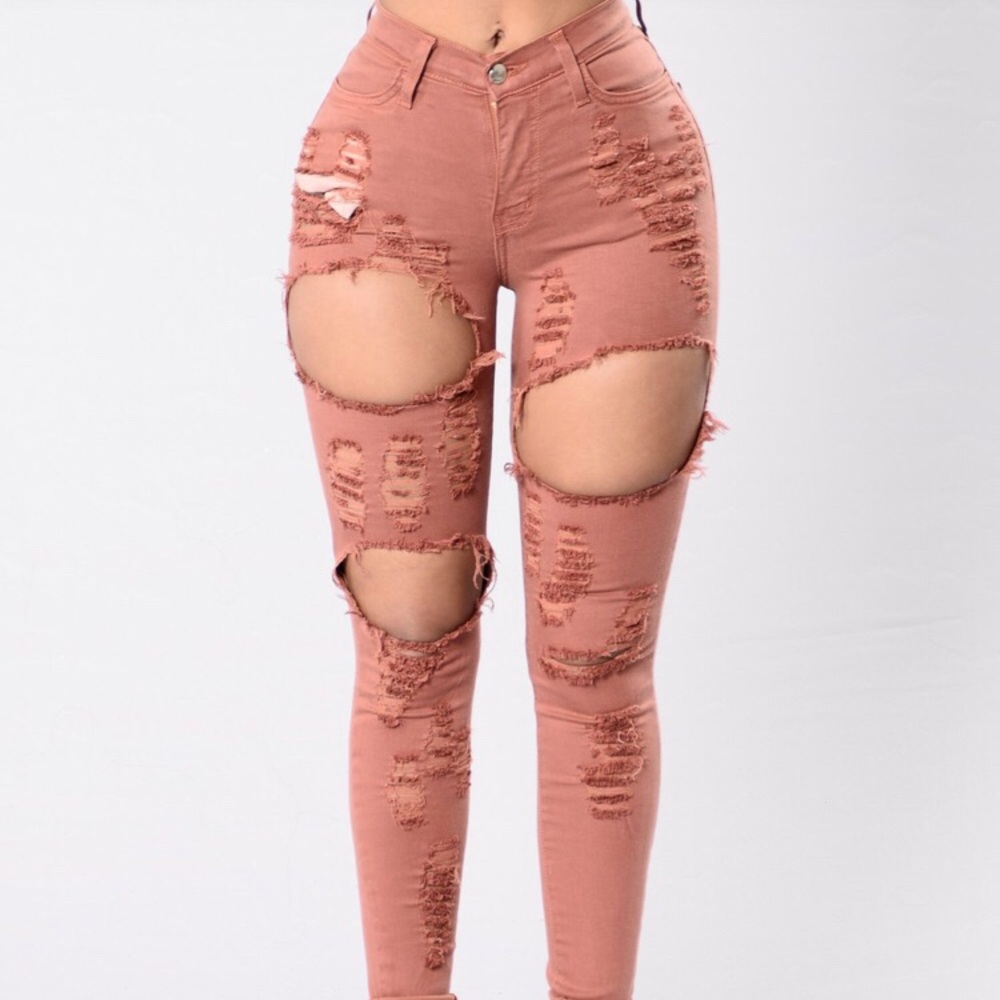 extreme measures jeans with rips,never worn